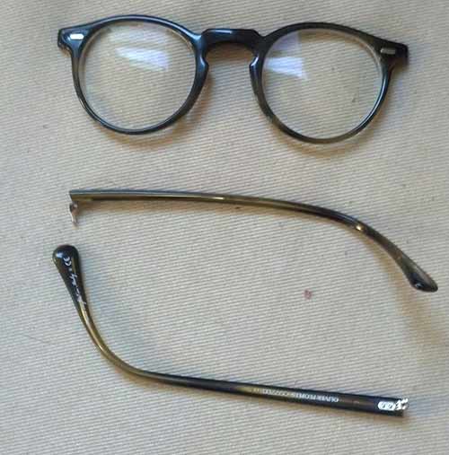Eyeglasses made by Oliver Peoples with broken side legs.